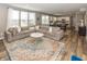 Open-concept living and dining area with modern decor and ample natural light at 16419 Connolly Dr, Westfield, IN 46074