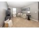 Comfortable living room with neutral colors, and plush carpeting at 16419 Connolly Dr, Westfield, IN 46074