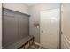 Inviting mudroom features built-in storage bench and convenient coat hooks at 16419 Connolly Dr, Westfield, IN 46074