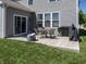 Back patio with seating, grill, and view of the backyard at 16419 Connolly Dr, Westfield, IN 46074