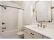 Modern bathroom features sleek vanity, bronze fixtures, and shower/tub combo for comfortable living at 1799 Hourglass Dr, Carmel, IN 46032