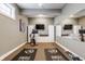 Well-equipped home gym with workout equipment, mirrors, and ample space for fitness activities at 1799 Hourglass Dr, Carmel, IN 46032