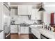 Bright, spacious kitchen features stainless steel appliances and white cabinetry at 1799 Hourglass Dr, Carmel, IN 46032