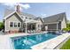 Outdoor pool with lounge area and pergola, perfect for summer relaxation and gatherings at 1799 Hourglass Dr, Carmel, IN 46032
