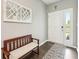 Inviting foyer with a decorative mirror, a cozy bench, and a stylish rug, creating a welcoming entrance at 1807 Orchard Dr, Fortville, IN 46040