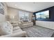 Comfortable living room with plush seating, large-screen TV, and stylish decor at 1807 Orchard Dr, Fortville, IN 46040
