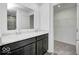 Bathroom with double sink vanity, granite countertop, and closet at 1943 Black Oak Dr, Shelbyville, IN 46176