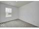 Bedroom with window and view of houses outside at 1943 Black Oak Dr, Shelbyville, IN 46176