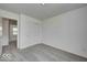Carpeted bedroom with a sliding closet door and window at 1943 Black Oak Dr, Shelbyville, IN 46176