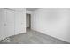 Spacious bedroom with double doors and neutral carpet at 1943 Black Oak Dr, Shelbyville, IN 46176