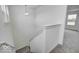 Bright stairwell with white trim and neutral carpet at 1943 Black Oak Dr, Shelbyville, IN 46176