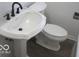 Bathroom featuring white sink and toilet at 201 W Essex St, Lebanon, IN 46052
