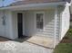 Charming home featuring an inviting entryway, concrete porch, and a neutral color palette at 201 W Essex St, Lebanon, IN 46052