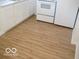 Kitchen featuring hardwood flooring and appliances at 201 W Essex St, Lebanon, IN 46052