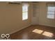Cozy living room with hardwood floors, built-in shelving, and lots of natural light at 201 W Essex St, Lebanon, IN 46052