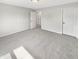 Bedroom showcasing plush carpet and neutral color palette and two bright white doors at 2913 Lily Dr, Lebanon, IN 46052