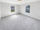 Carpeted bedroom with natural light from windows at 2913 Lily Dr, Lebanon, IN 46052