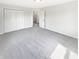 Bright bedroom featuring neutral colors, plush carpeting, and a spacious closet at 2913 Lily Dr, Lebanon, IN 46052