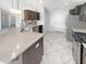 Modern kitchen with stainless steel appliances, granite countertops, and ample cabinet space at 2913 Lily Dr, Lebanon, IN 46052