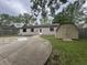 Backyard featuring a shed, pool, and the back of the house at 3055 Pawnee Dr, Indianapolis, IN 46235