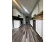 A kitchen features stainless steel appliances and wood floor at 3055 Pawnee Dr, Indianapolis, IN 46235