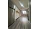 Modern kitchen with stainless appliances and sleek flooring at 3055 Pawnee Dr, Indianapolis, IN 46235