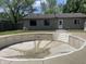 Backyard swimming pool needing repair at 3055 Pawnee Dr, Indianapolis, IN 46235