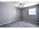 Inviting bedroom features soft carpet, fresh paint, and natural light at 3072 Falcon Dr, Indianapolis, IN 46222
