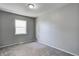 Cozy bedroom with plush carpet and natural light at 3072 Falcon Dr, Indianapolis, IN 46222