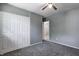 Comfortable bedroom with soft carpet, fresh paint, and a spacious closet at 3072 Falcon Dr, Indianapolis, IN 46222