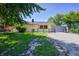 Charming home exterior with a small, fenced-in front yard and a welcoming entrance at 3072 Falcon Dr, Indianapolis, IN 46222