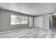 Bright living room with large windows and stylish flooring at 3072 Falcon Dr, Indianapolis, IN 46222