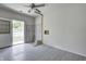 Unfinished space features a door to the backyard and tiled wall at 3072 Falcon Dr, Indianapolis, IN 46222