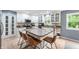Bright and spacious kitchen with white cabinetry, an island with seating, and stainless steel appliances at 3230 Amherst St, Indianapolis, IN 46268