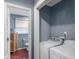 Convenient laundry area featuring washer and dryer hookups located near the bathroom at 3230 Amherst St, Indianapolis, IN 46268
