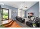 Comfortable living room featuring a fireplace, vaulted ceilings, and stylish decor at 3230 Amherst St, Indianapolis, IN 46268