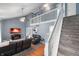 Inviting living room showcasing vaulted ceilings, a cozy loft, and comfortable seating at 3230 Amherst St, Indianapolis, IN 46268