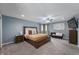 Large primary bedroom with a sitting area and ample natural light at 3230 Amherst St, Indianapolis, IN 46268