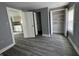 Bedroom with walk-in closets and hardwood floors at 3342 Foltz St, Indianapolis, IN 46221