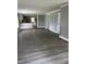 Living room features hardwood floors and an open kitchen layout at 3342 Foltz St, Indianapolis, IN 46221