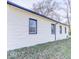 View of exterior of the side of the home showing the window trim and brick at 3342 Foltz St, Indianapolis, IN 46221