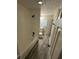 A bright bathroom with a white shower and new floors at 3628 Breen Dr, Indianapolis, IN 46235