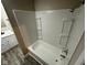 Renovated bathroom featuring a shower and tub at 3628 Breen Dr, Indianapolis, IN 46235