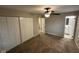 This bedroom features a carpet, a ceiling fan and an ensuite bathroom at 3628 Breen Dr, Indianapolis, IN 46235
