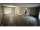 Open living room showcases modern floors and a staircase leading to the upper level at 3628 Breen Dr, Indianapolis, IN 46235
