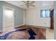 Bedroom with a ceiling fan and a large rug at 502 S Harrison St, Alexandria, IN 46001