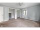 Comfortable bedroom featuring a ceiling fan and two closets for ample storage space at 502 S Harrison St, Alexandria, IN 46001