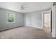 Airy bedroom featuring a ceiling fan and a window, creating a comfortable living space at 502 S Harrison St, Alexandria, IN 46001