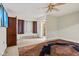 Bedroom with a ceiling fan and a large rug at 502 S Harrison St, Alexandria, IN 46001