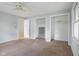 Bright bedroom with two closets and a ceiling fan, providing ample storage and comfort at 502 S Harrison St, Alexandria, IN 46001